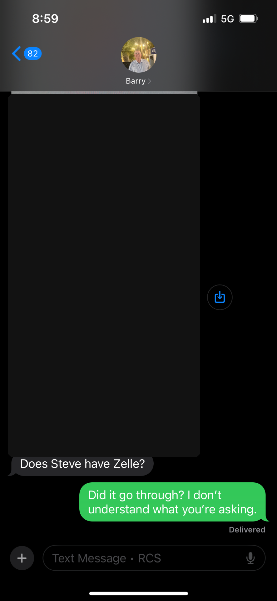 Redacted text messages exchanging address information.